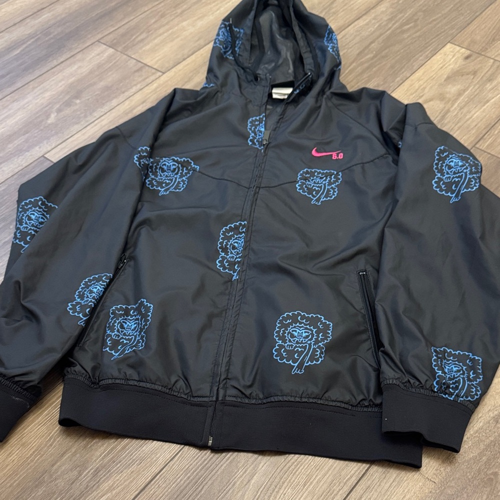 Nike Kids Black Jacket with Blue Graphics